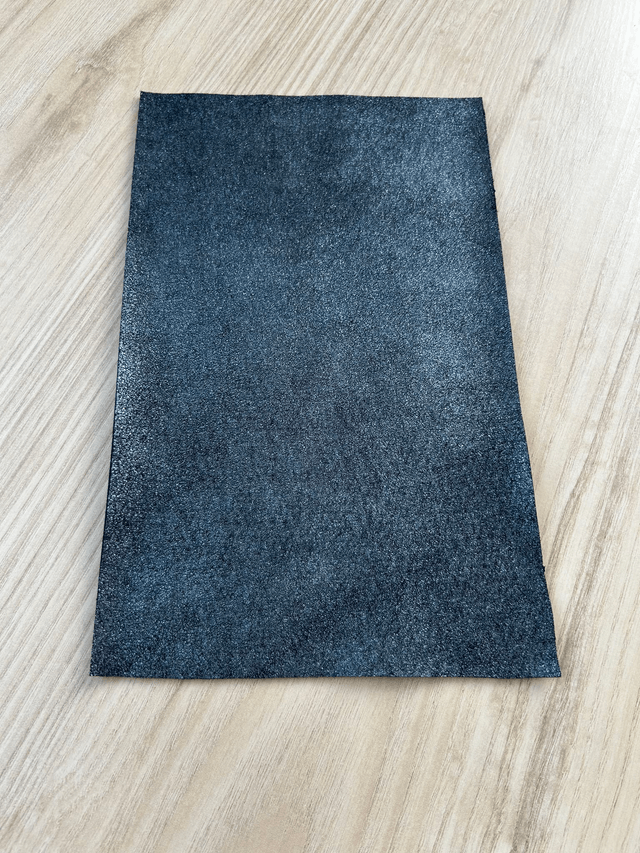 Chute de cuir bleu marine pétrole pailleté