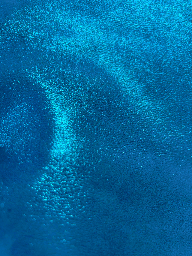 Chute de cuir turquoise pailleté 
