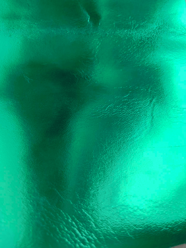 Chute de cuir vert métallisé miroir
