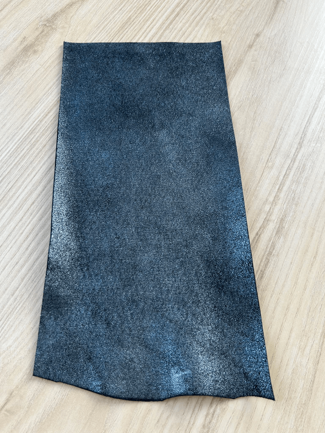 Chute de cuir bleu marine pétrole pailleté