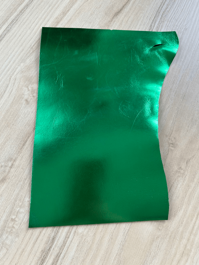Chute de cuir vert métallisé miroir