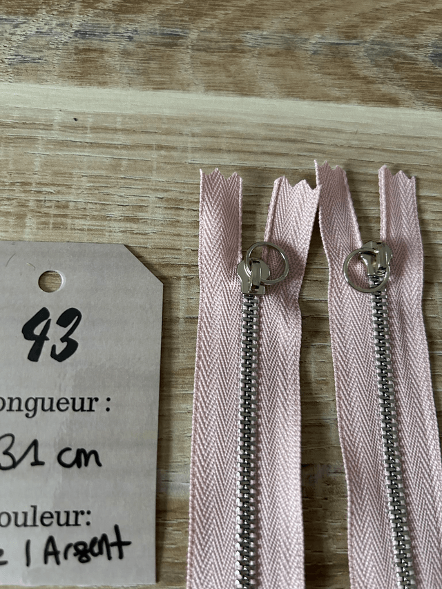 Fermetures éclair métallique rose pale 31cm