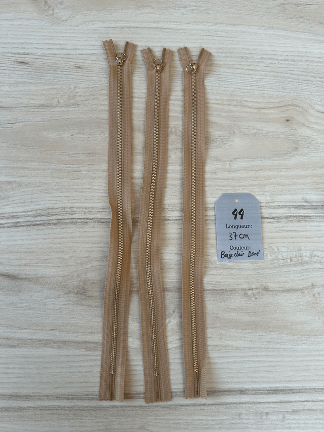 Fermetures éclair métallique beige doré 37cm