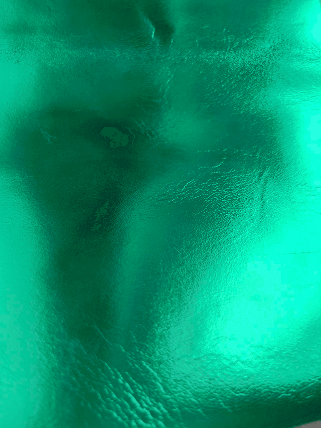 Chute de cuir vert métallisé miroir