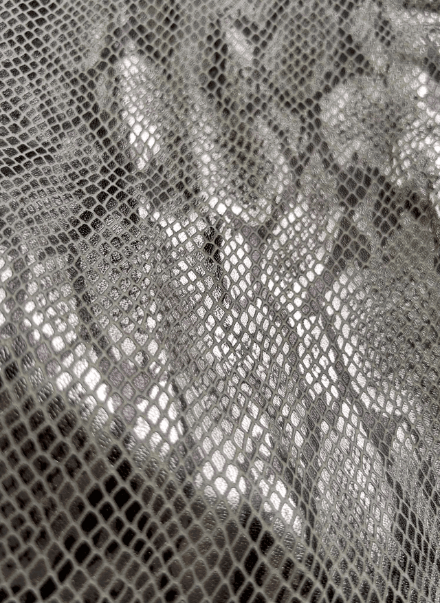 Chute de cuir marron imitatio serpent 