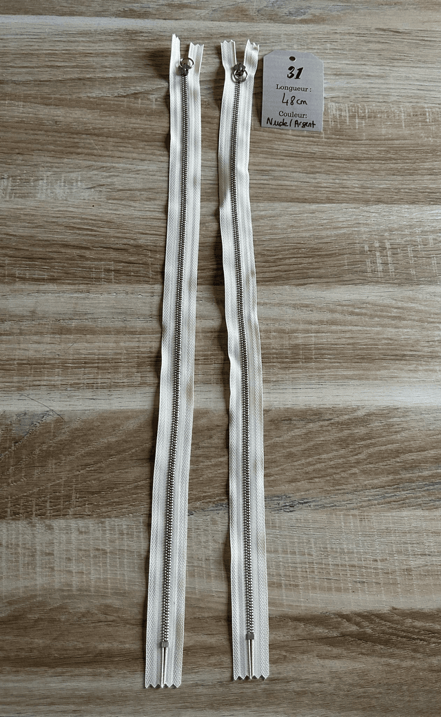 Fermetures éclair métallique nude 48cm